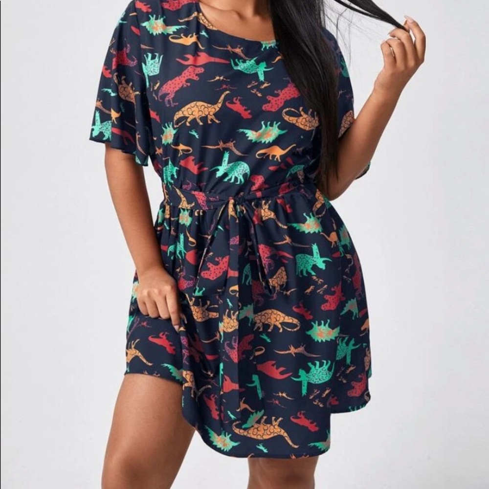 Brand new never worn. Dinosaur print dress